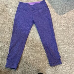EUC Beyond Yoga purple cut out mid rise capri leggings size S